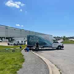 <p><strong>Auto Facility (1 of 2)</strong></p> A local auto distributor facility called with backed up drains in the building. No messy cleanup. No damage to the facility's beautiful grass.