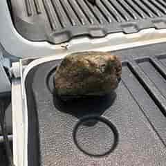 <p><strong>A Rock in the Sewer Line</strong></p> We used our Picote claw to pull this rock out of a 6” sewer main. This rock was backing up a public sewer line under a street. We went in through the manhole cover with our grabber to get it out.